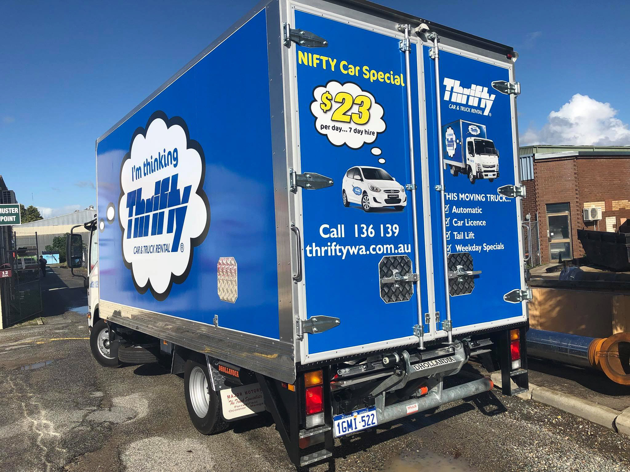 Thrifty car and truck rental branded fleet box truck wrap